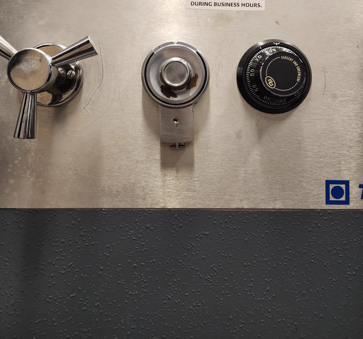 Commercial safe handle and Sargent and Greenleaf dial on brushed steel