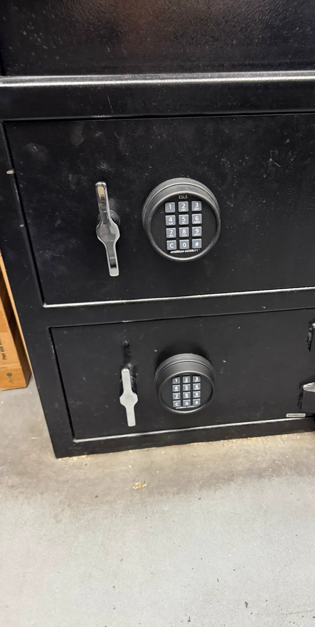 Tall double-door depository safe with a deposit hopper above the main compartment
