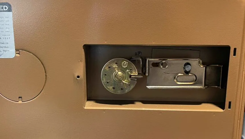 Relock mechanism inside a fire safe door exposed during repair