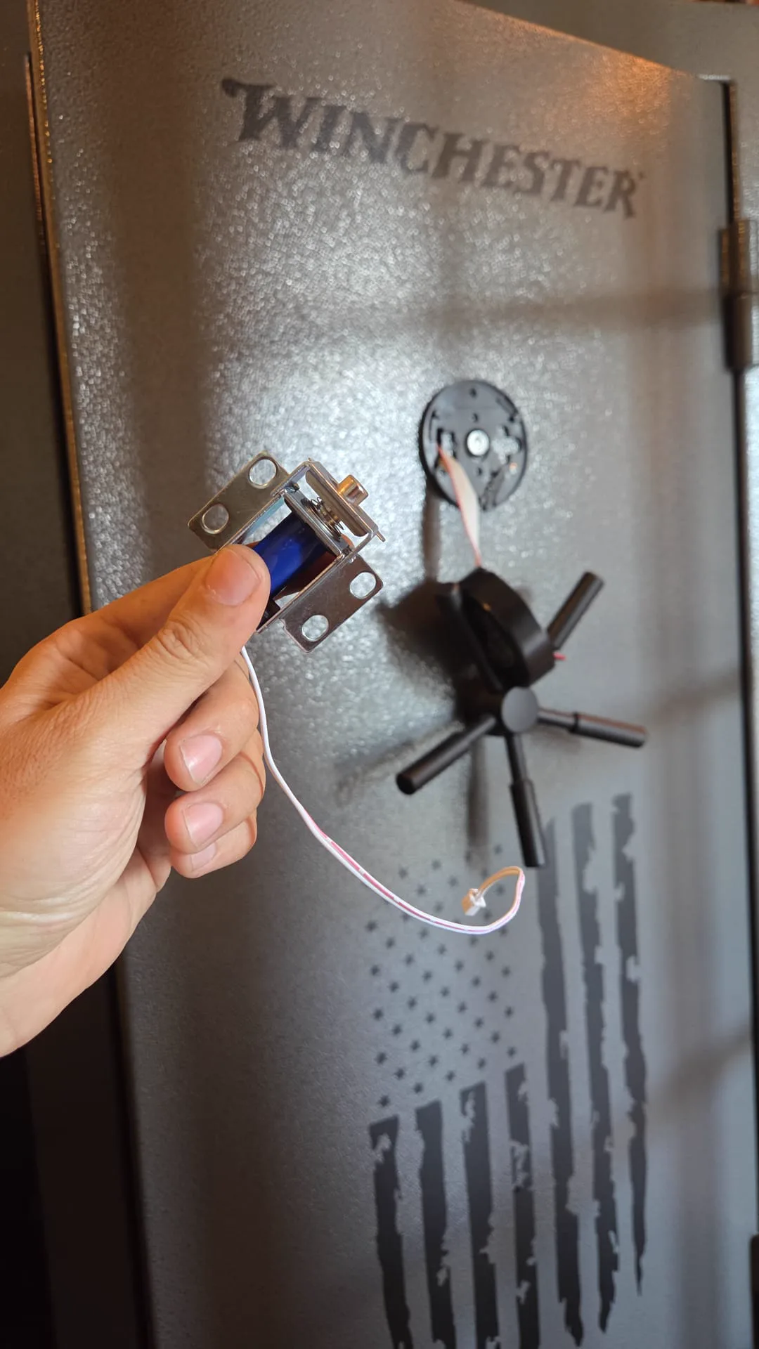 New replacement safe lock ready to be installed on a gun safe door