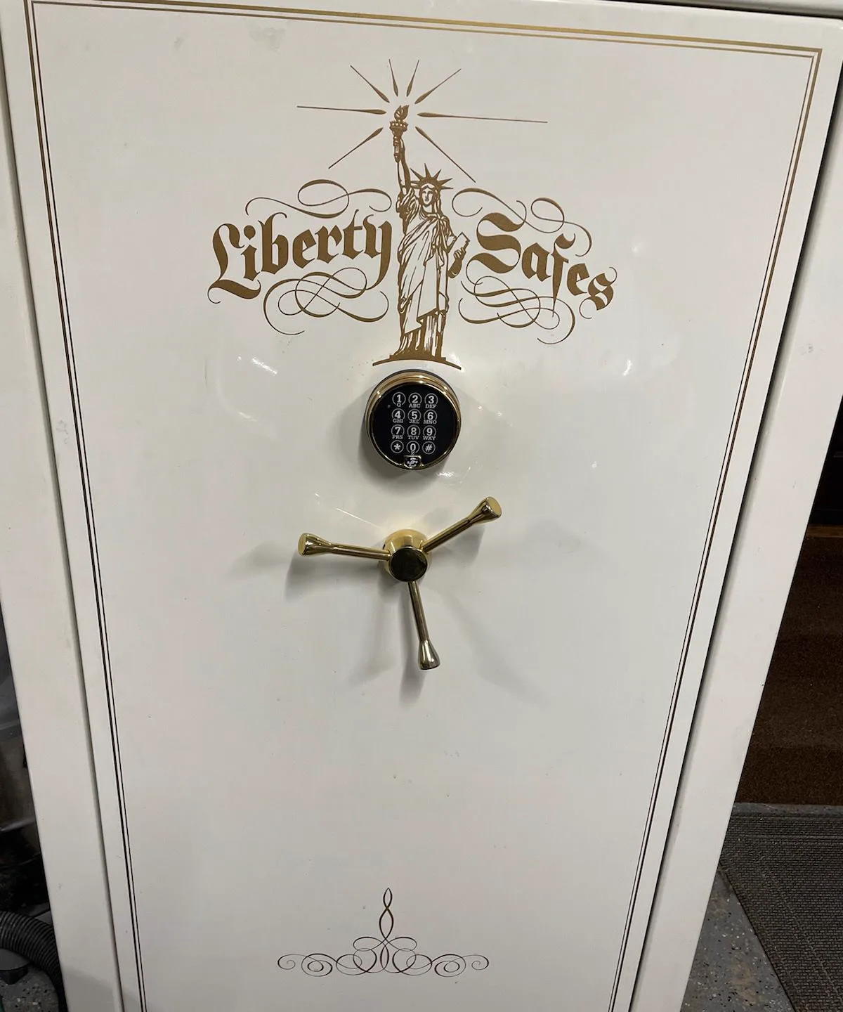 Liberty gun safe with electronic keypad in a San Diego garage