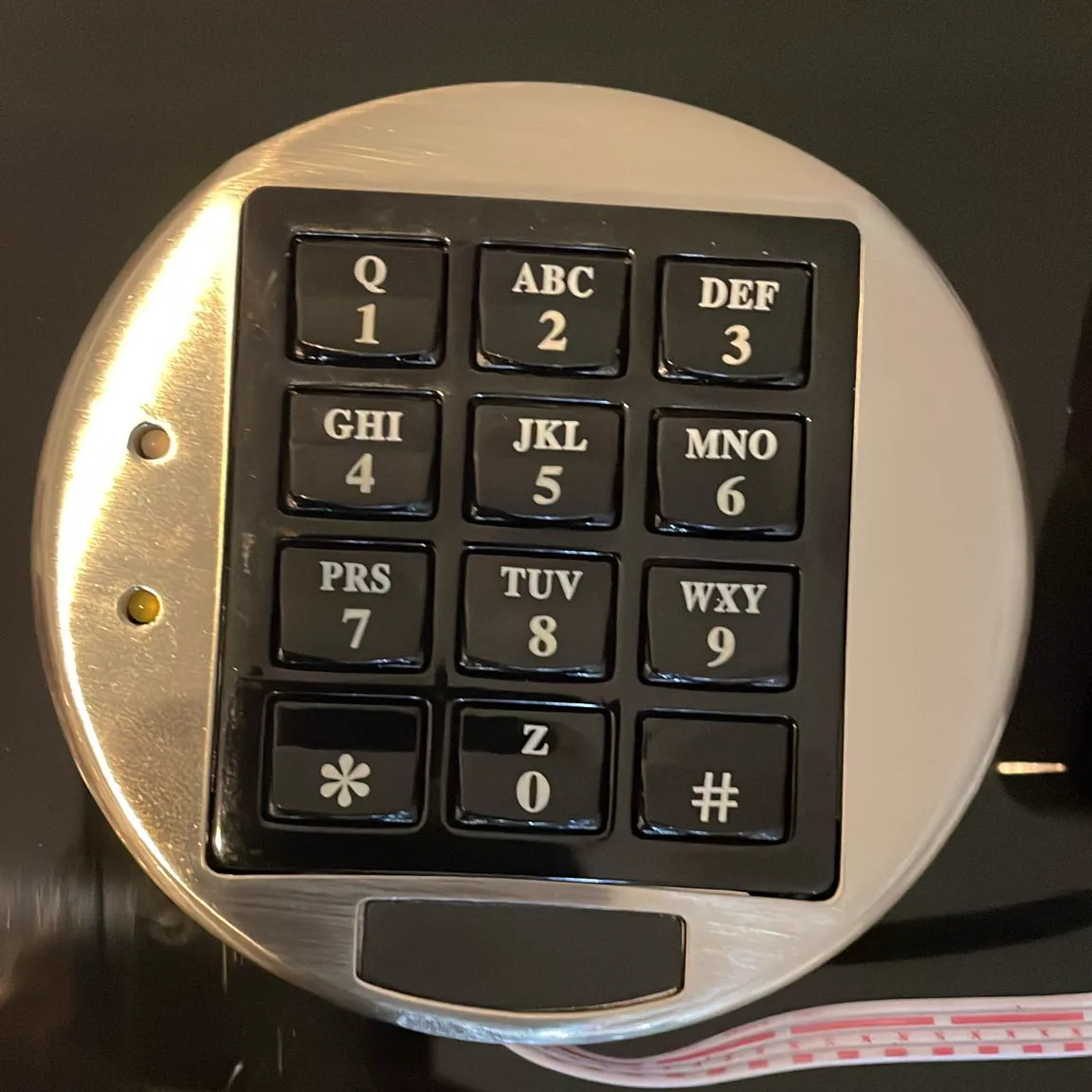 New electronic keypad mounted on a safe after lock replacement