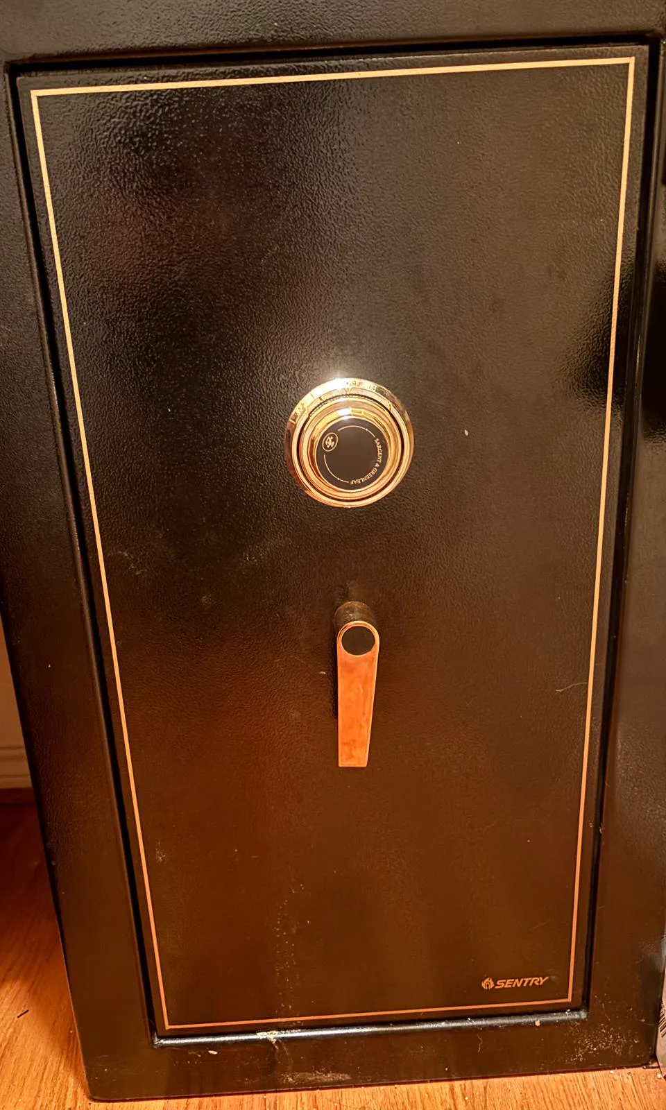 SentrySafe gun safe with a brass mechanical combination dial